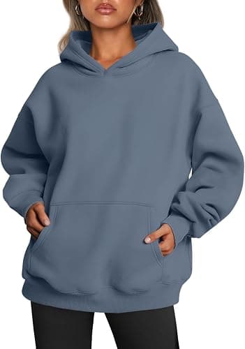 Oversized brushed fleece hoodie shown on a relaxed drop shoulder fit
