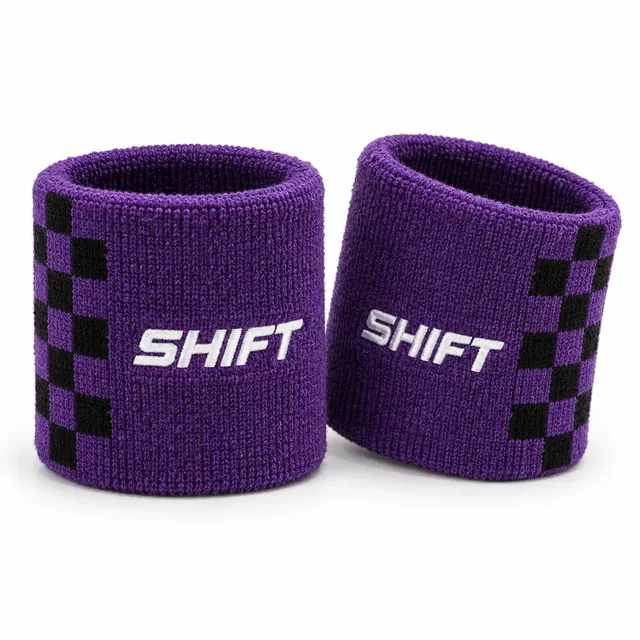 Purple woolen wristbands with a black checkerboard panel and white italic lettering