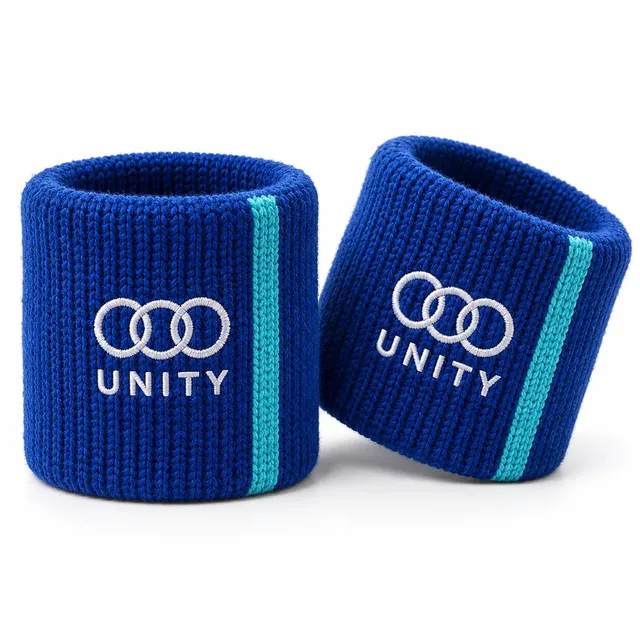 Cobalt blue woolen wristbands with a cyan stripe and a white knitted ring logo and wordmark